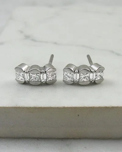 A unique pair of cuff style drop earrings boasts alternating.jpg