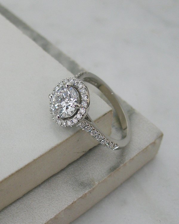 A diamond halo antique inspired ring.jpg