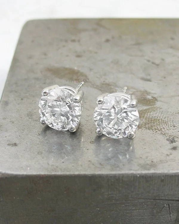 A pair of diamond stud earrings in platinum 600.jpg