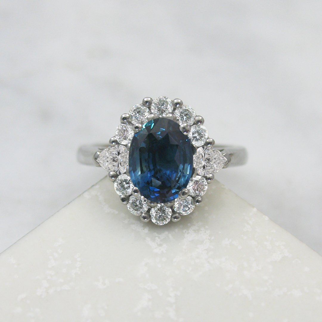 Oval sapphire cluster ring1080x1080.jpg