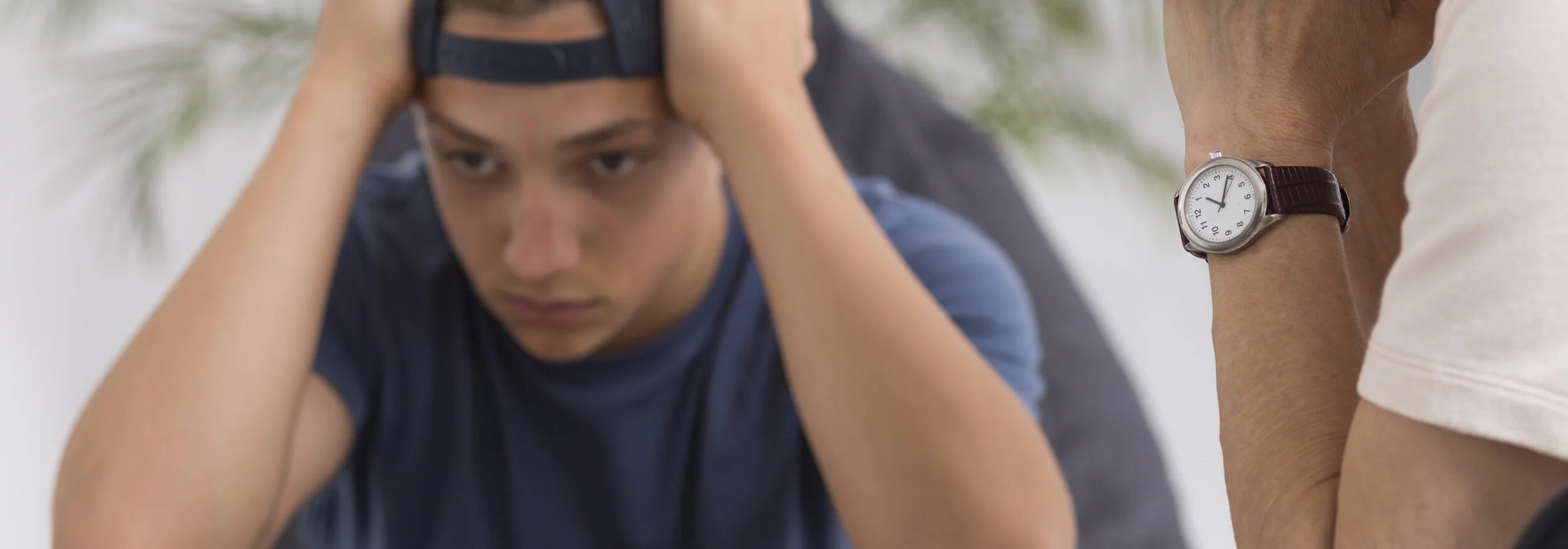 hands on head man.jpeg