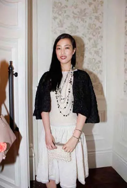 Yi Zhou wore Chanel attended ELLE China-Huayi event Red Carpet, Shanghai. During Shanghai film festival, 2012