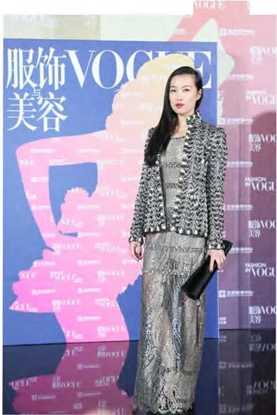 Yi Zhou wore Chanel on Vogue 120th anniversary exhibition and event, Red Carpet in Beijing. 