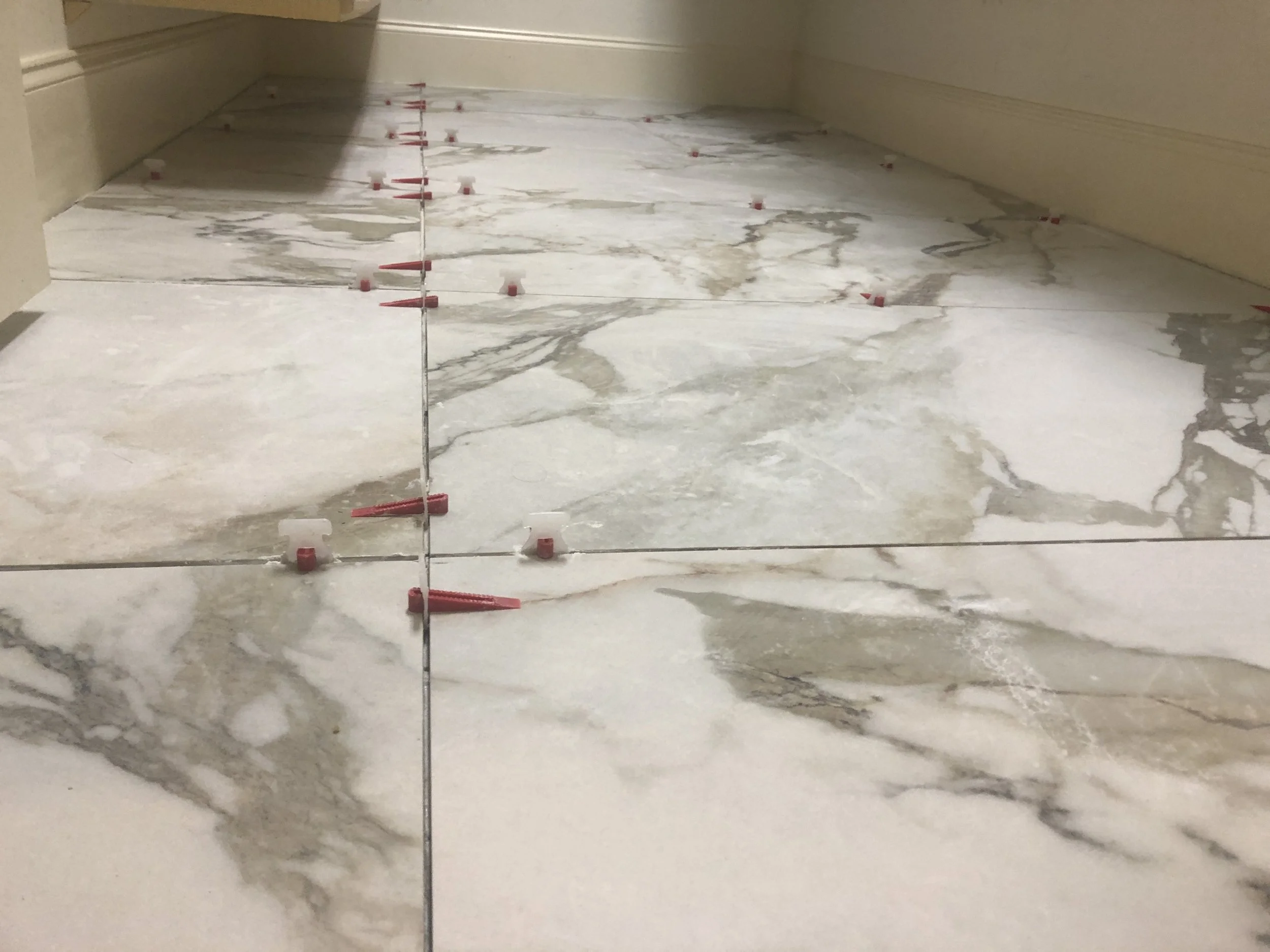 large format tile install-closet.jpeg