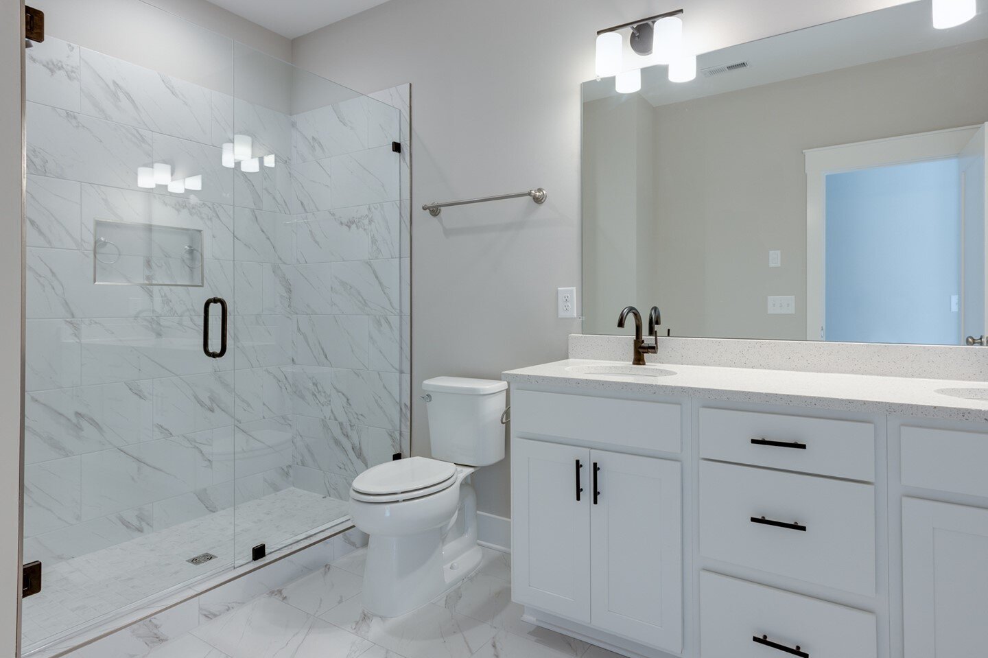 Marble tile and black hardware? Yes please! 

This master bathroom is the perfect combination of luxury and simplicity. 🤩

#bellemeade #bellevue #bellemeadetn #bellevuerealestate #bellevuetn #townhome #townhouse #nashville #nashvilletn #nashvillerea