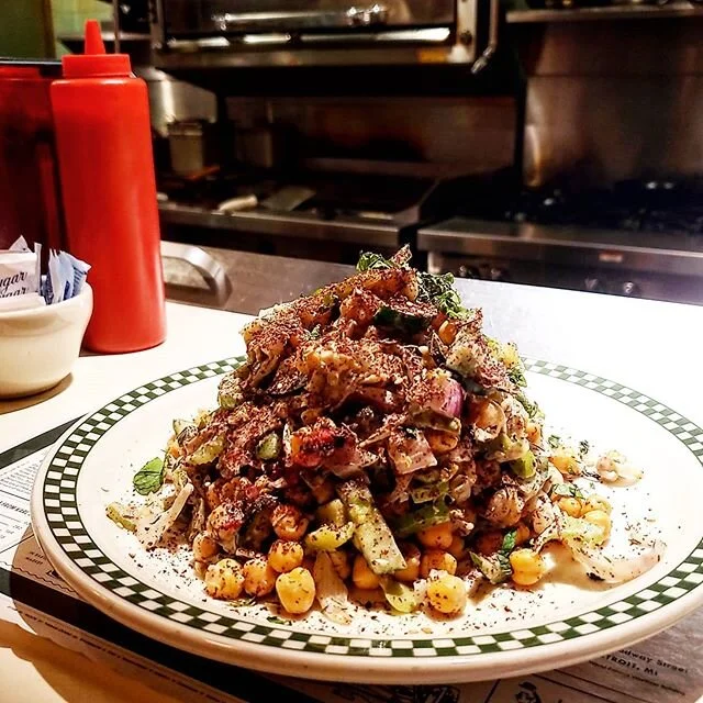 Named after the historic Wurlitzer Building that we call home, the Wurlitzer Salad is loaded with chickpeas, tahini, red pepper, and cucumber. Vegan friendly, too! 🥗 .
.
#karlsdetroit #thesirenhotel #vegan