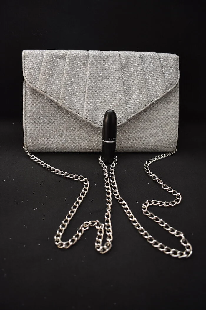 #40a ROLAND CARTIER SILVER CLUTCH