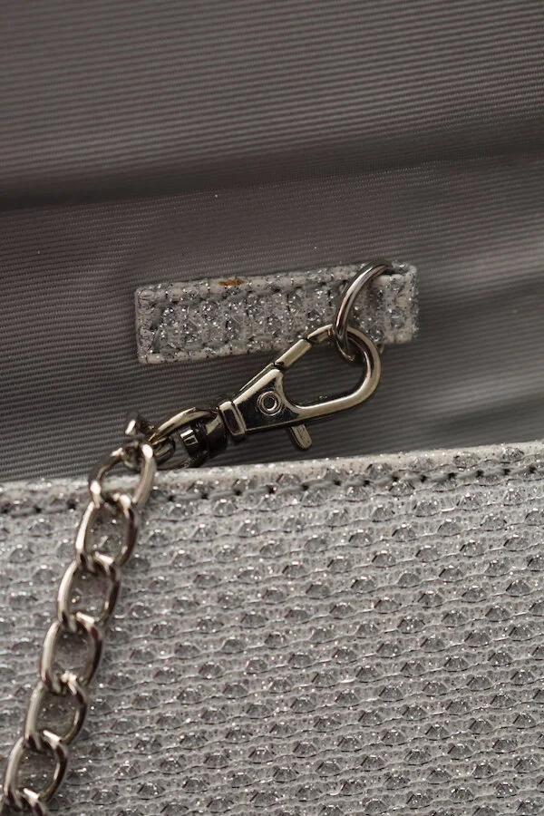 #40a ROLAND CARTIER SILVER CLUTCH