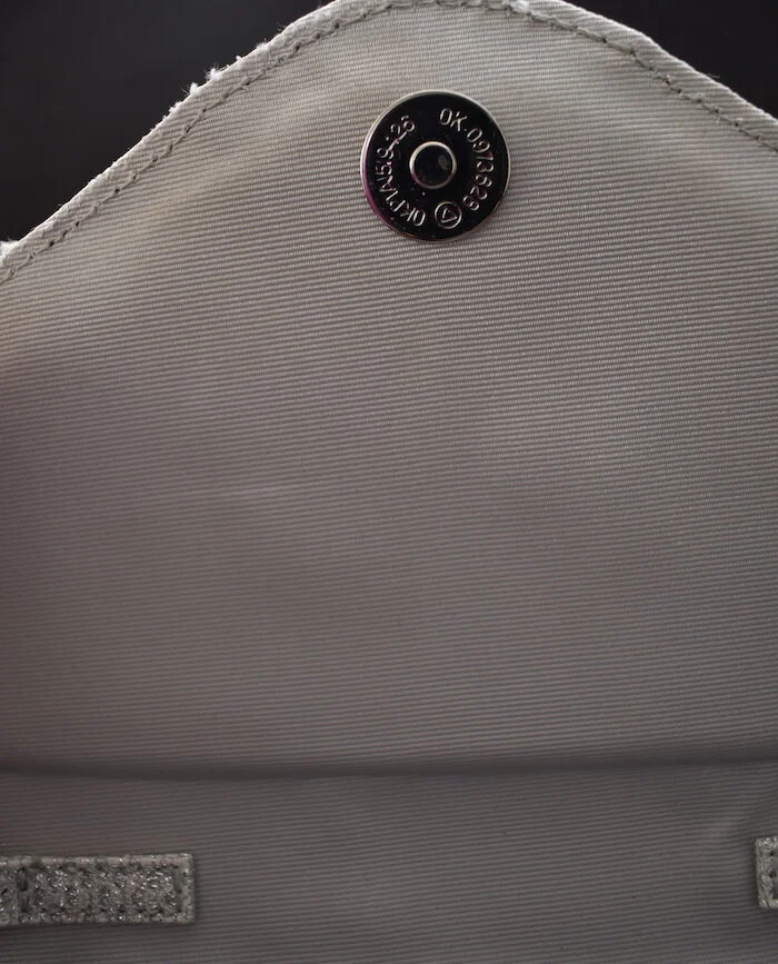 #40a ROLAND CARTIER SILVER CLUTCH