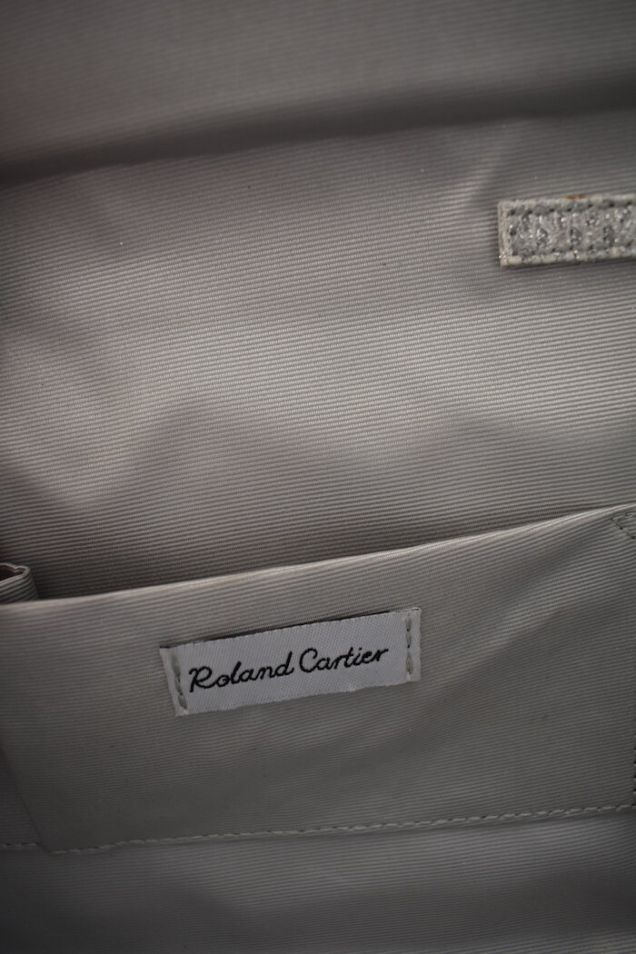roland cartier silver clutch bag