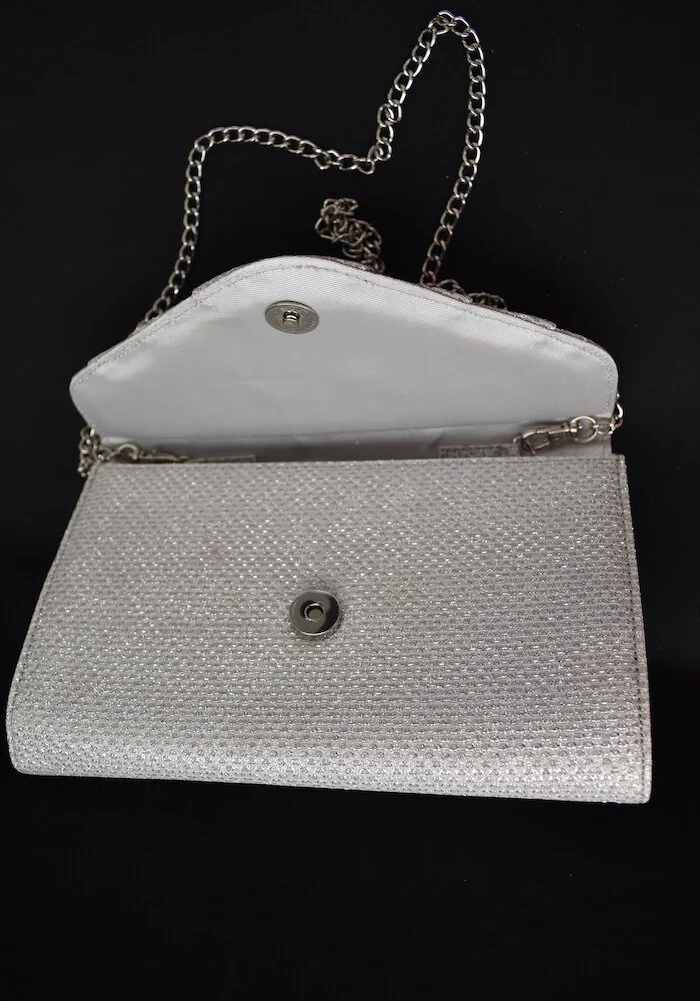 #40a ROLAND CARTIER SILVER CLUTCH