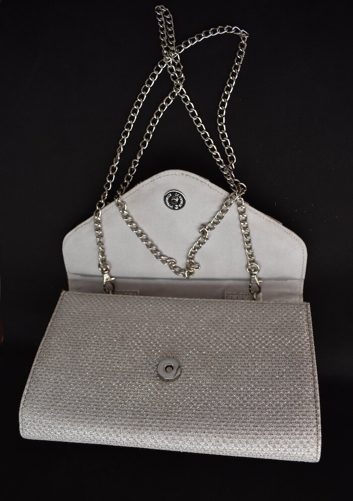 roland cartier silver bag