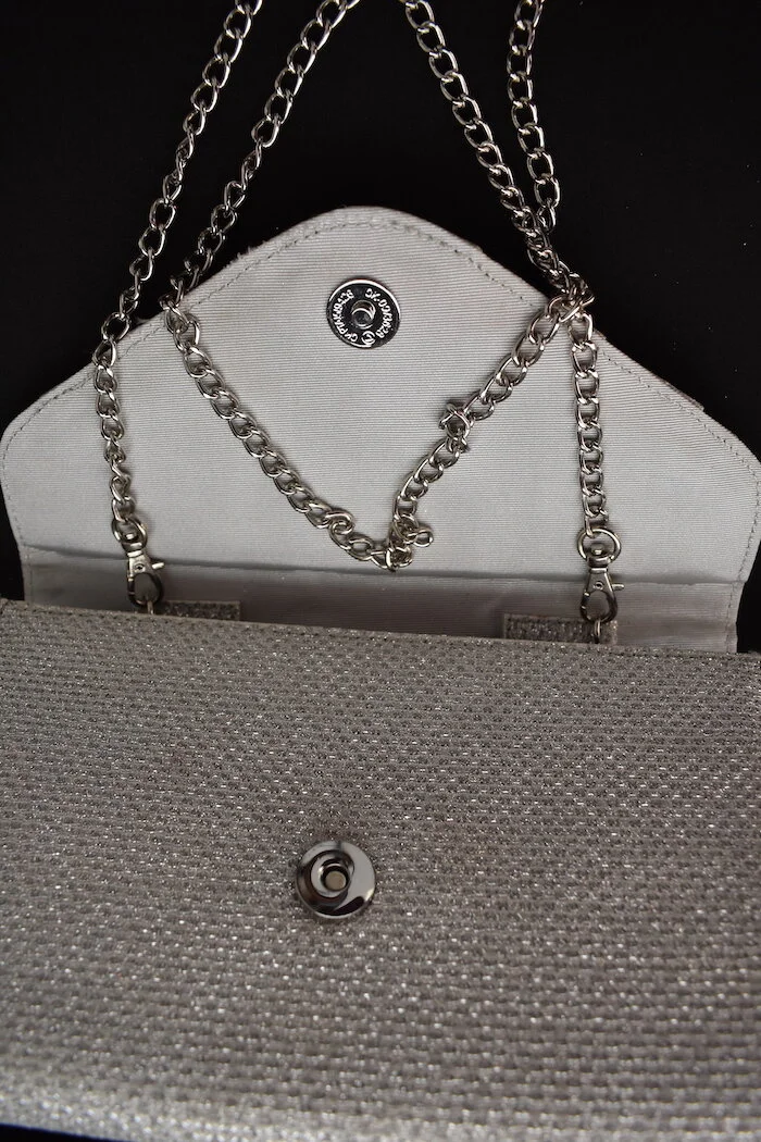 #40a ROLAND CARTIER SILVER CLUTCH