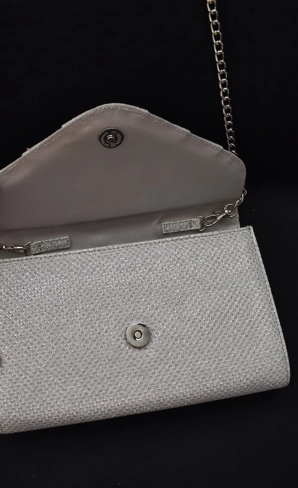 #40a ROLAND CARTIER SILVER CLUTCH