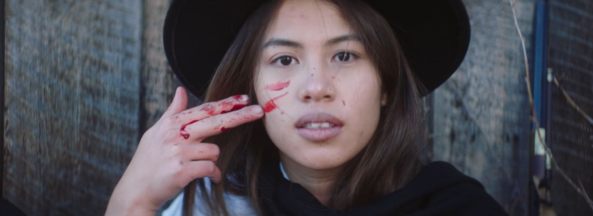  Here’s a still frame of the female lead wiping fake blood on her face in one of the scenes. The SFX artist had a blast using it for the multiple gun wounds in this spaghetti western we shot for Silo. 