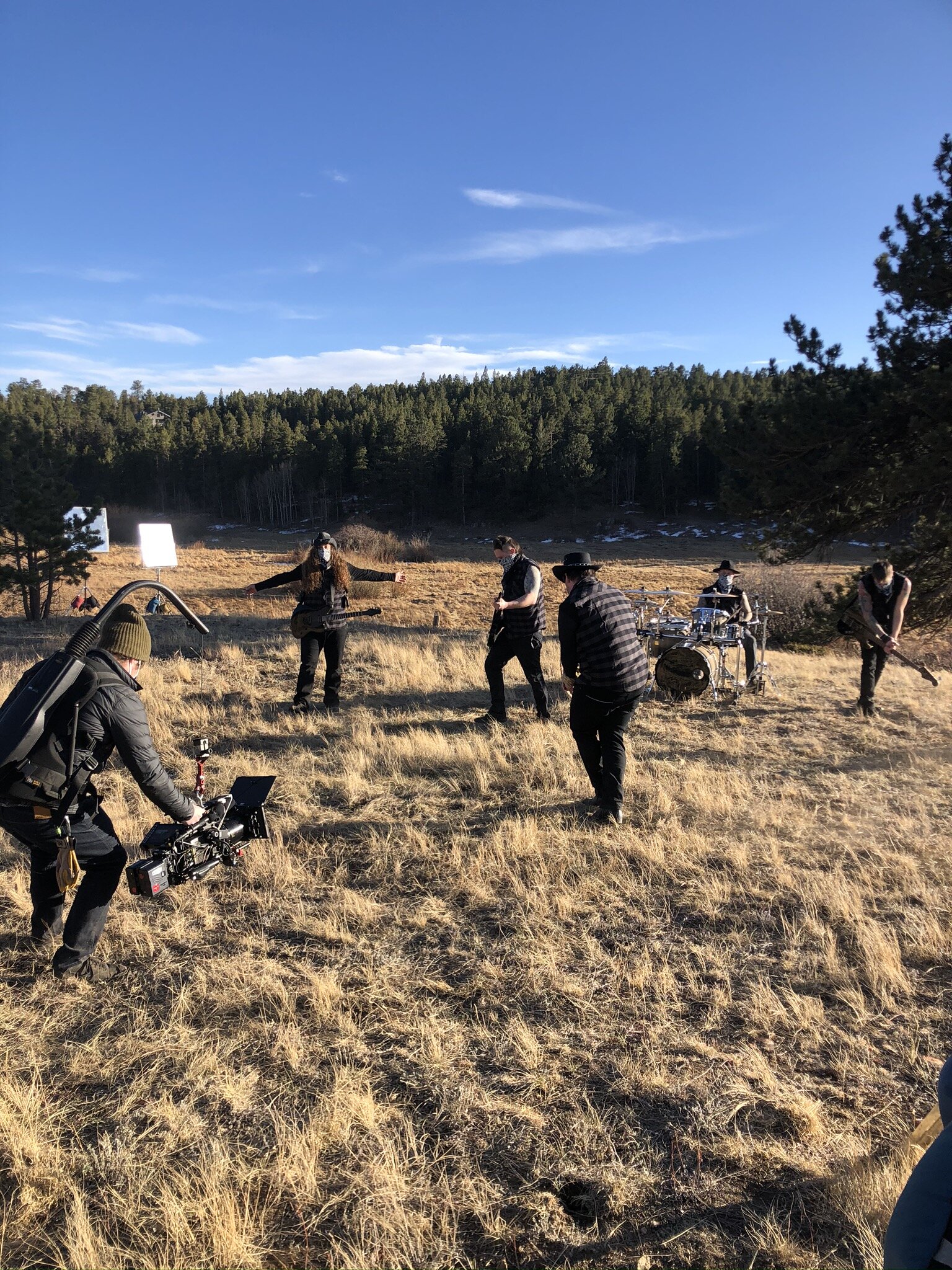  The band playing and getting down in front of the camera. 