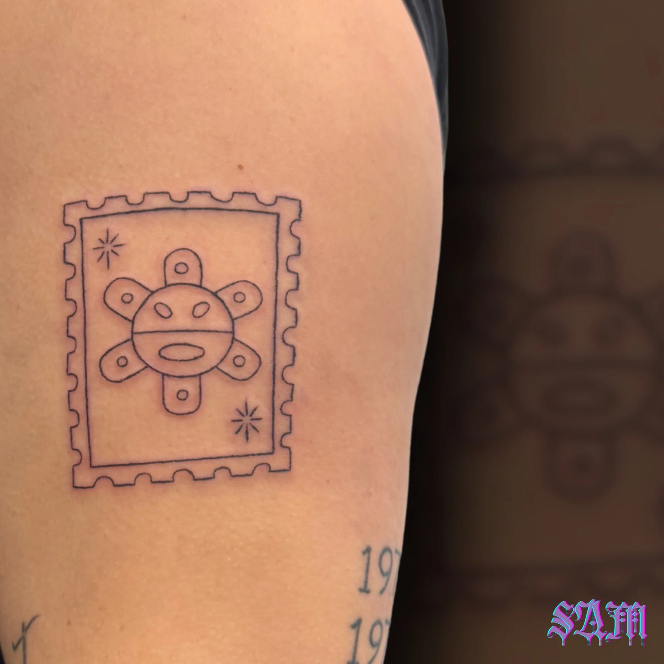 Special delivery ☀️ This Ta&iacute;no Sun postage stamp done by @samjadeink is proof that minimal, clean lines can make a beautiful statement. It&rsquo;s warm, bright, and perfectly executed.

If you could send a postcard from anywhere in the world r