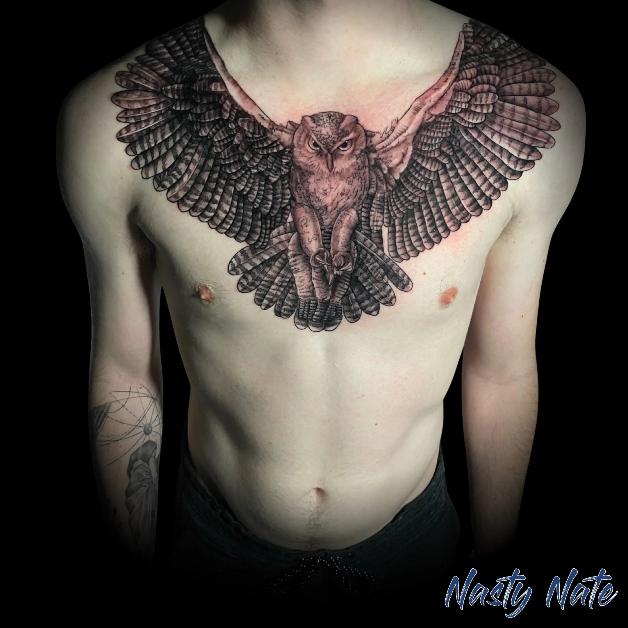 Night owl energy. @tattoos_by_nastynate spent some serious time on the feather work for this one, and the symmetry across the chest is spot on. If you&rsquo;re looking to take on a larger project, Nate&rsquo;s attention to flow and detail is hard to 