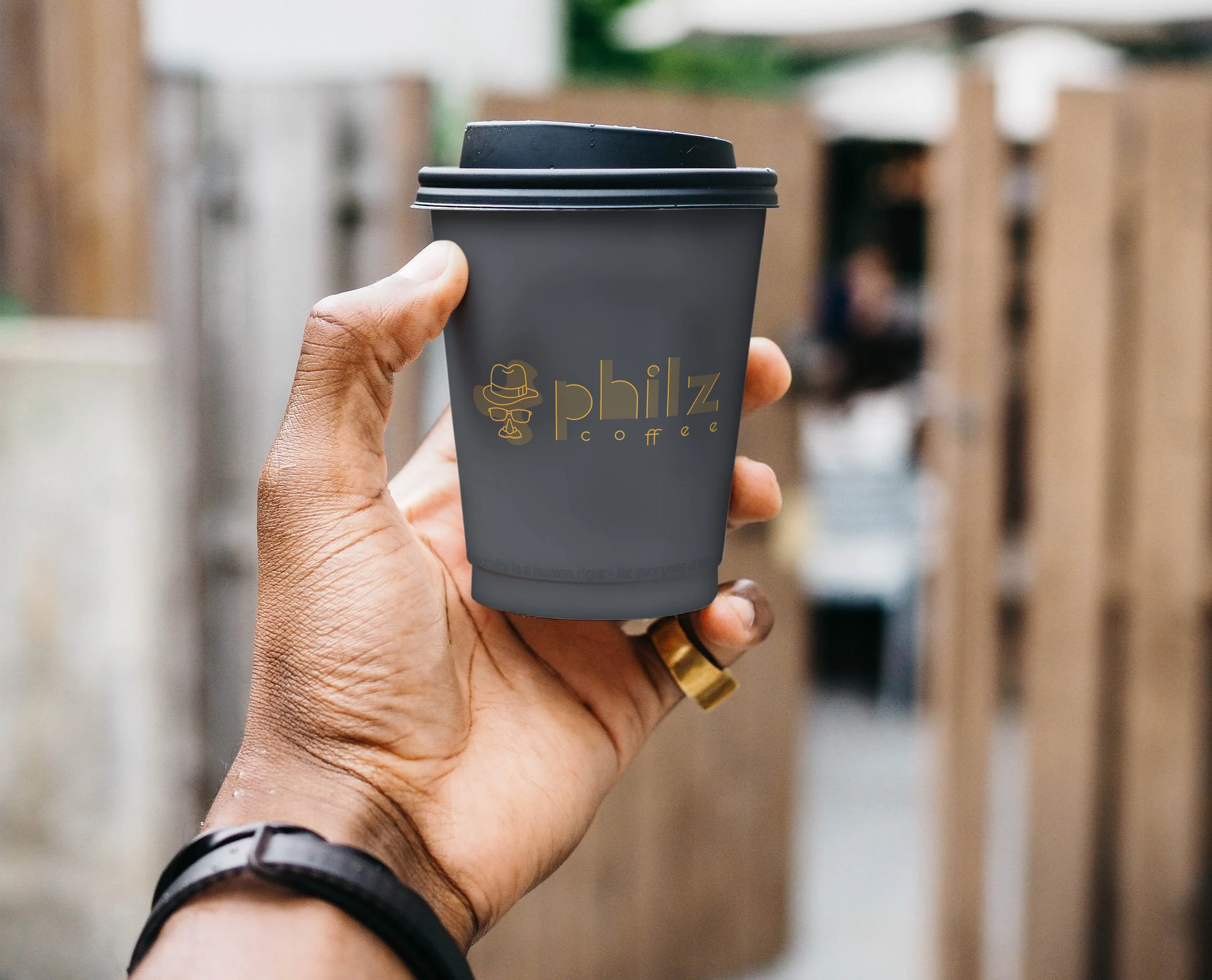 Cup Mockup with Hand.jpg