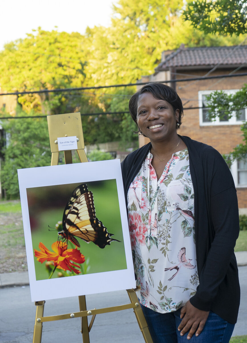  Comocrea Johnson, of McKeesport, with her photograph of a butterfly she captured in Renzie Park.  