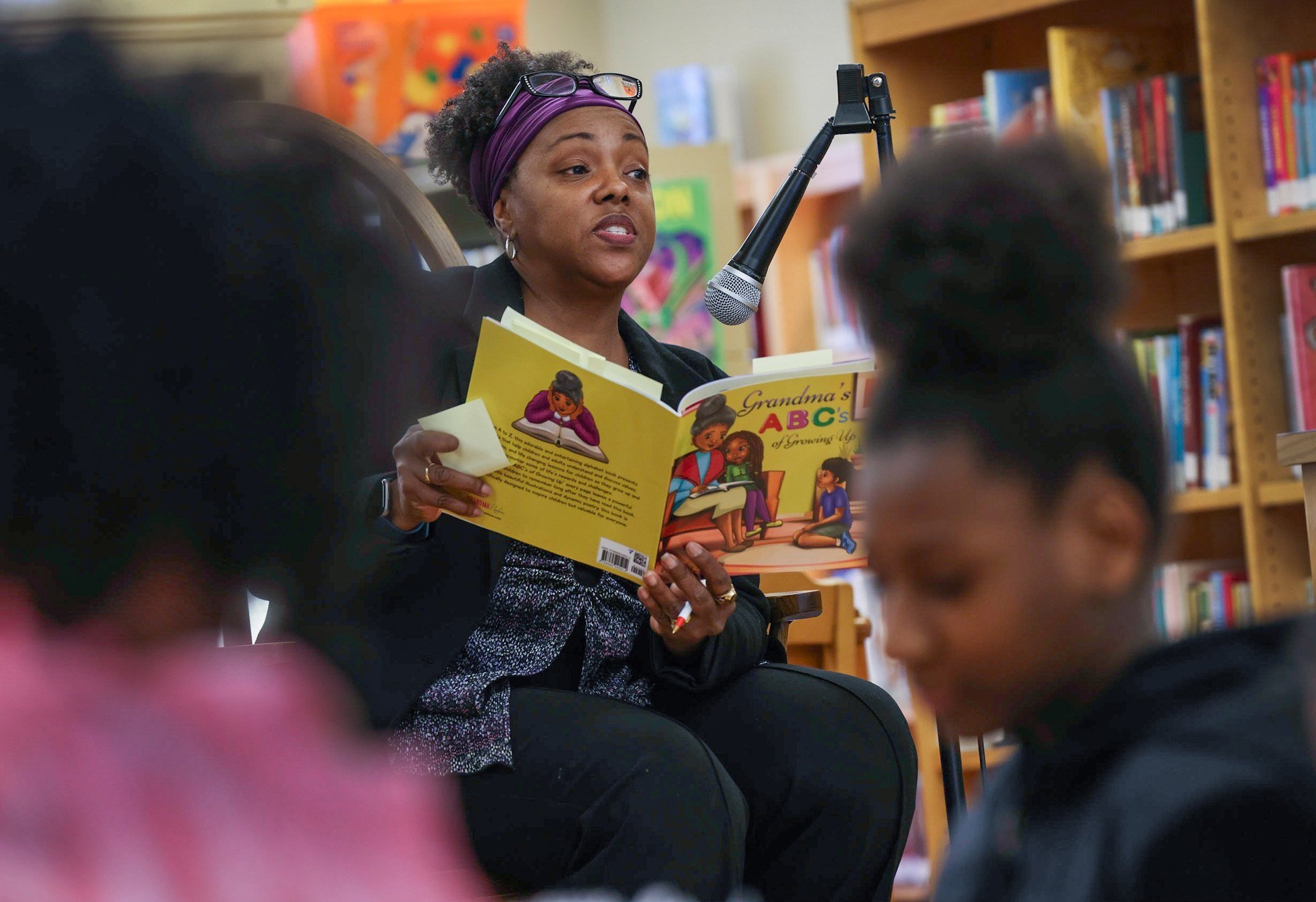  Author Denise Bailey read her new children’s book Grandma’s ABCs of Growing Up at the McKeesport Library’s Black History Month Celebration.   Photograph by Comocrea Johnson  