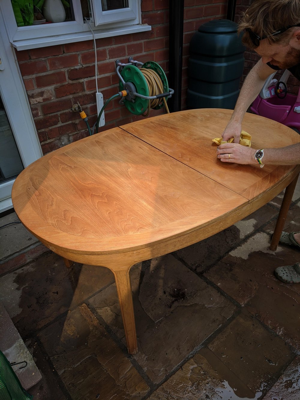 Treating our hand-me-down dining table with beeswax and love