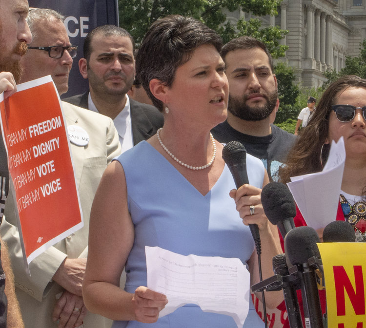 Amanda speaking at SCOTUS tight.jpg