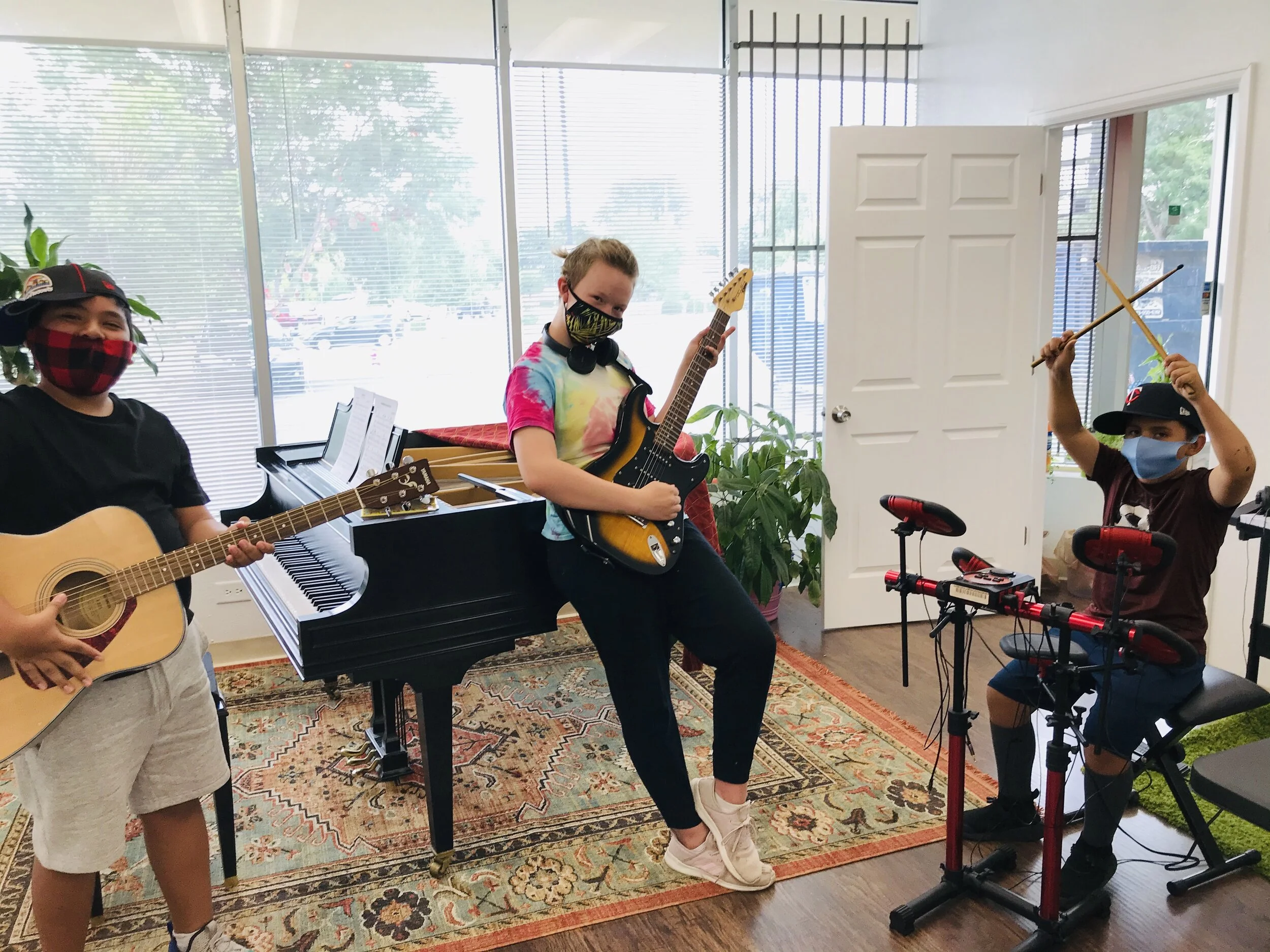 New Cottage Arts All-Stars poses for a picture in the middle of rehearsal!