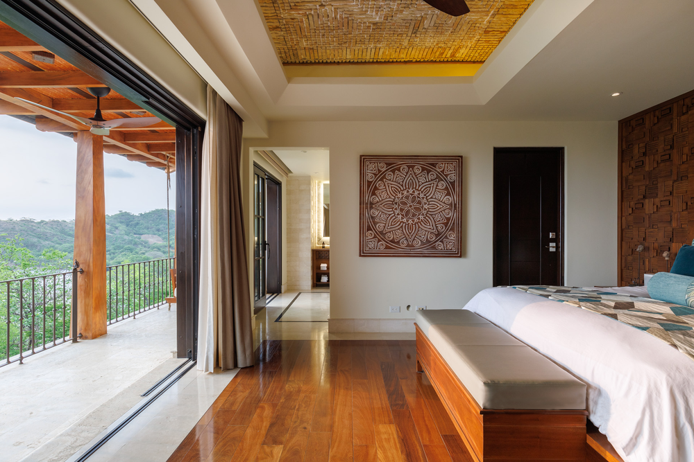 Shared living space at Villa Alberti opening to the Pacific