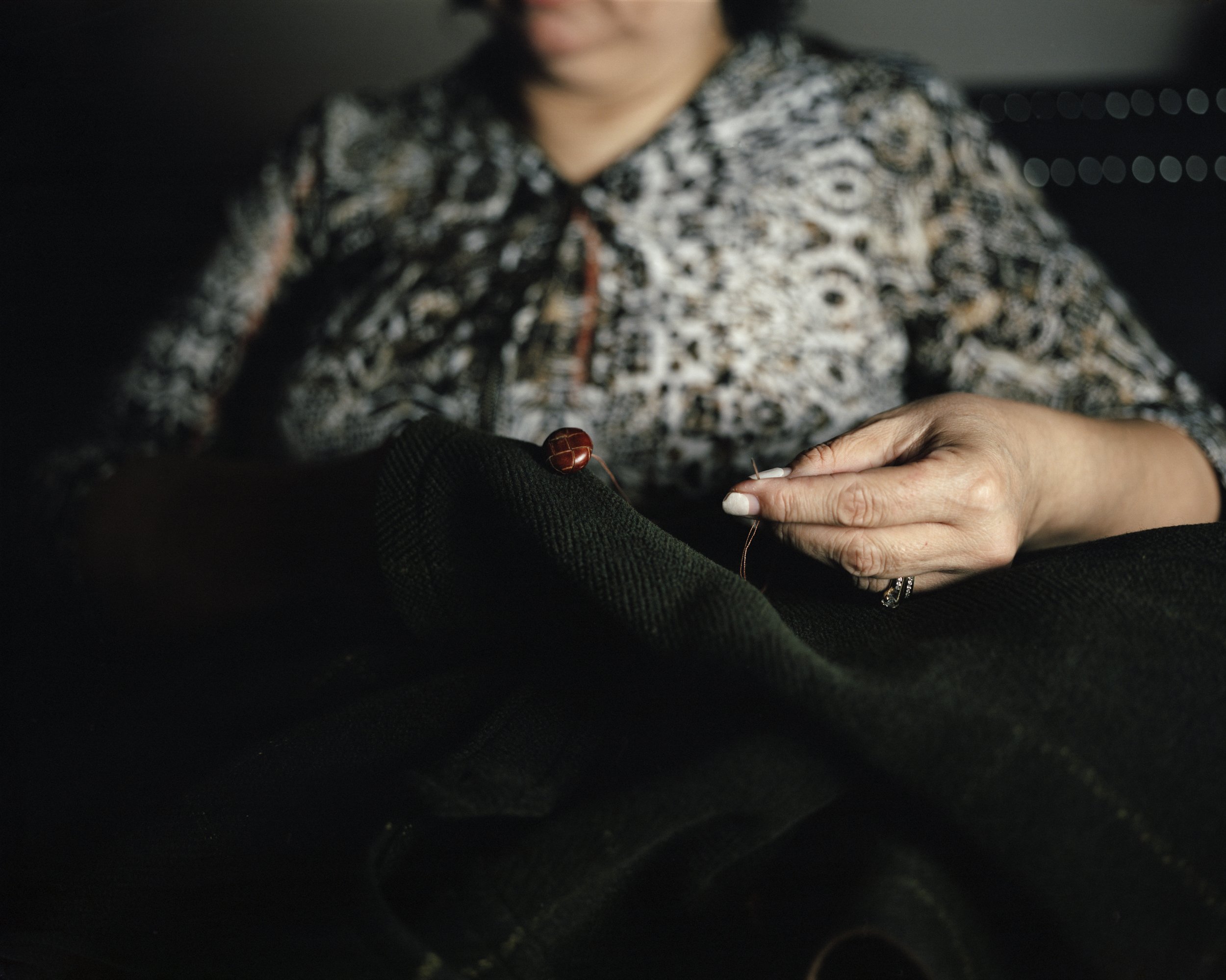 The Family Body: Mother stitching, after Carol Mavor