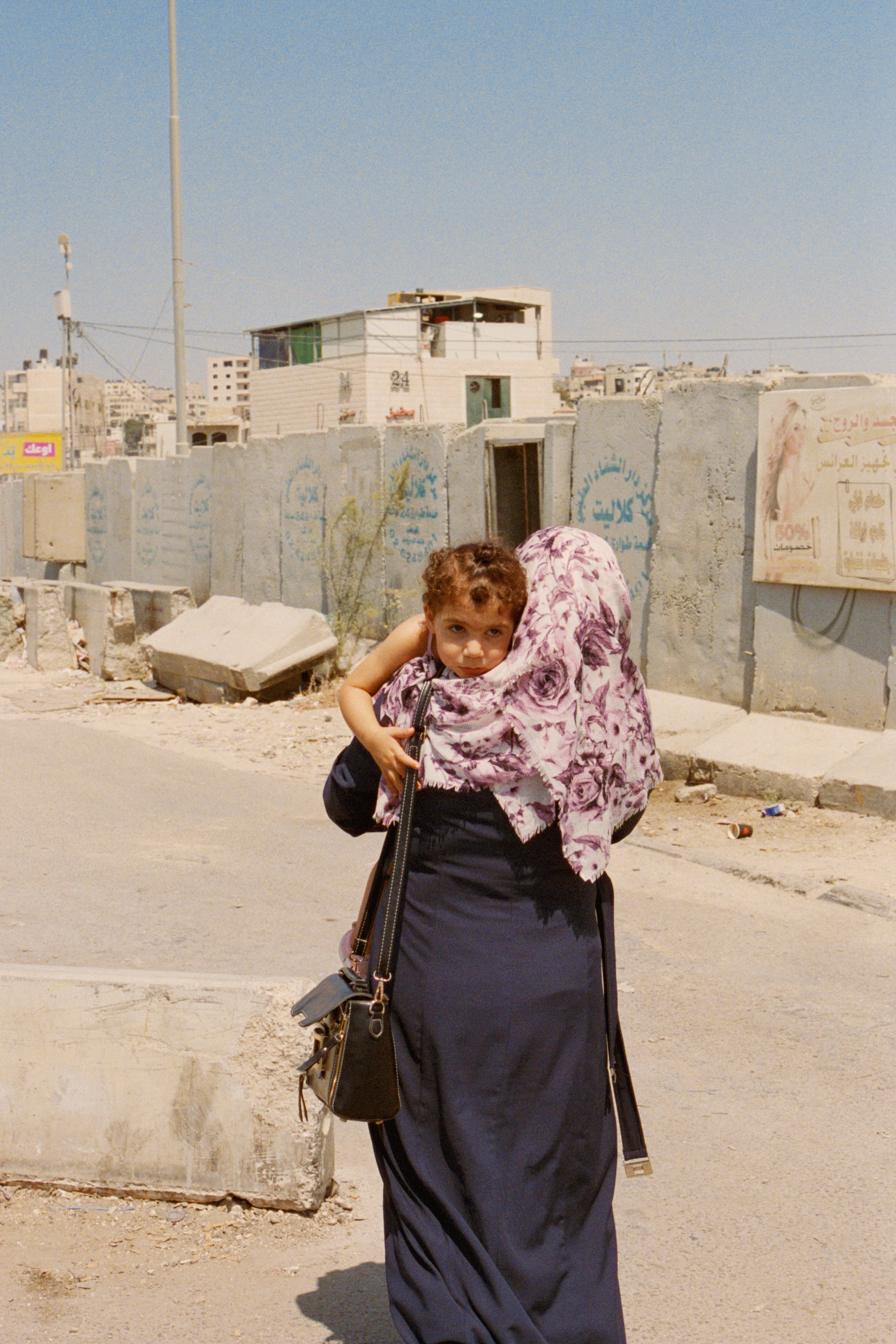 Woman with Daughter at Qalandiya Checkpoint, West Bank, 2018 