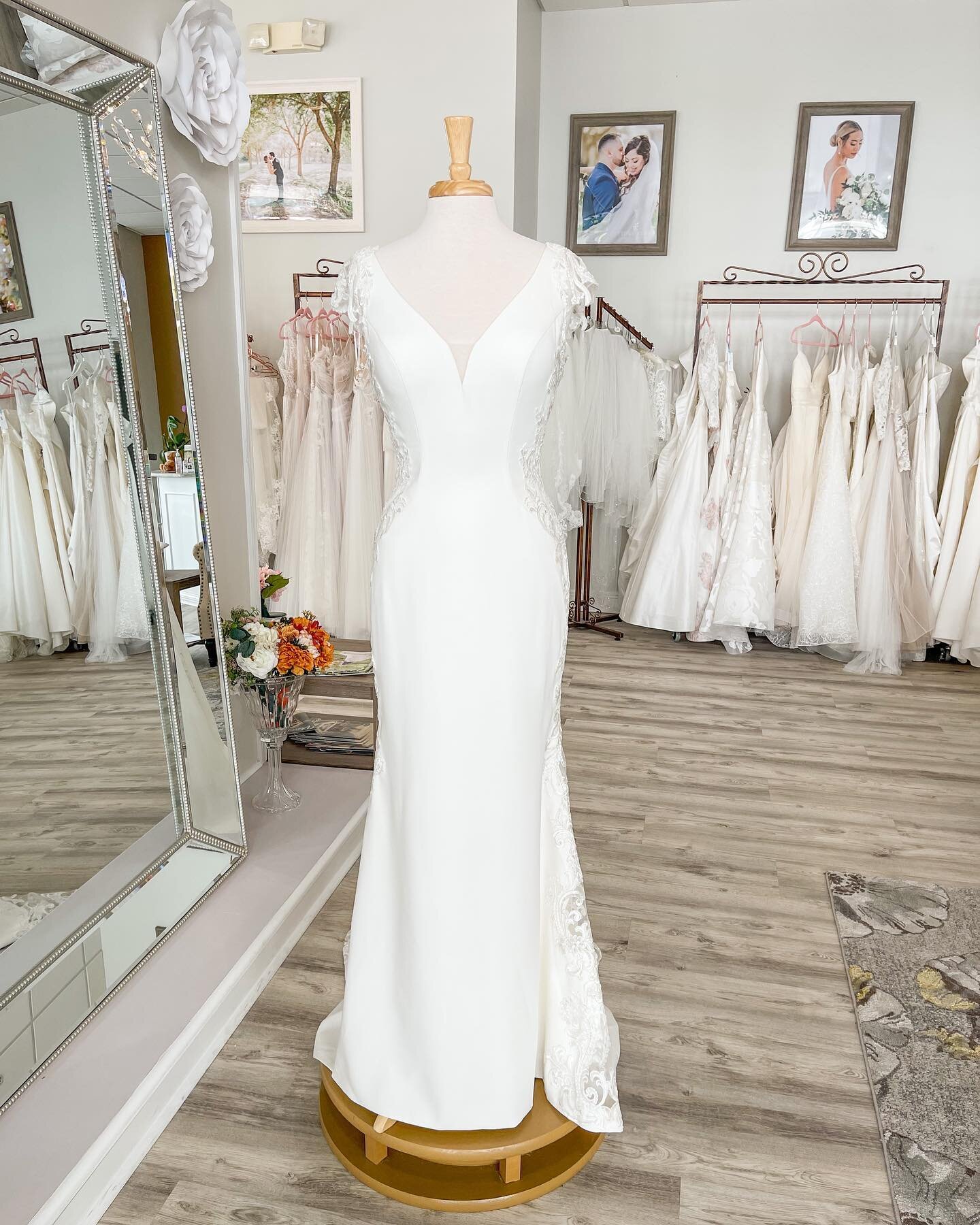 This sophisticated and sexy @moonlightbridal beauty is just BEGGING you to come try her on!