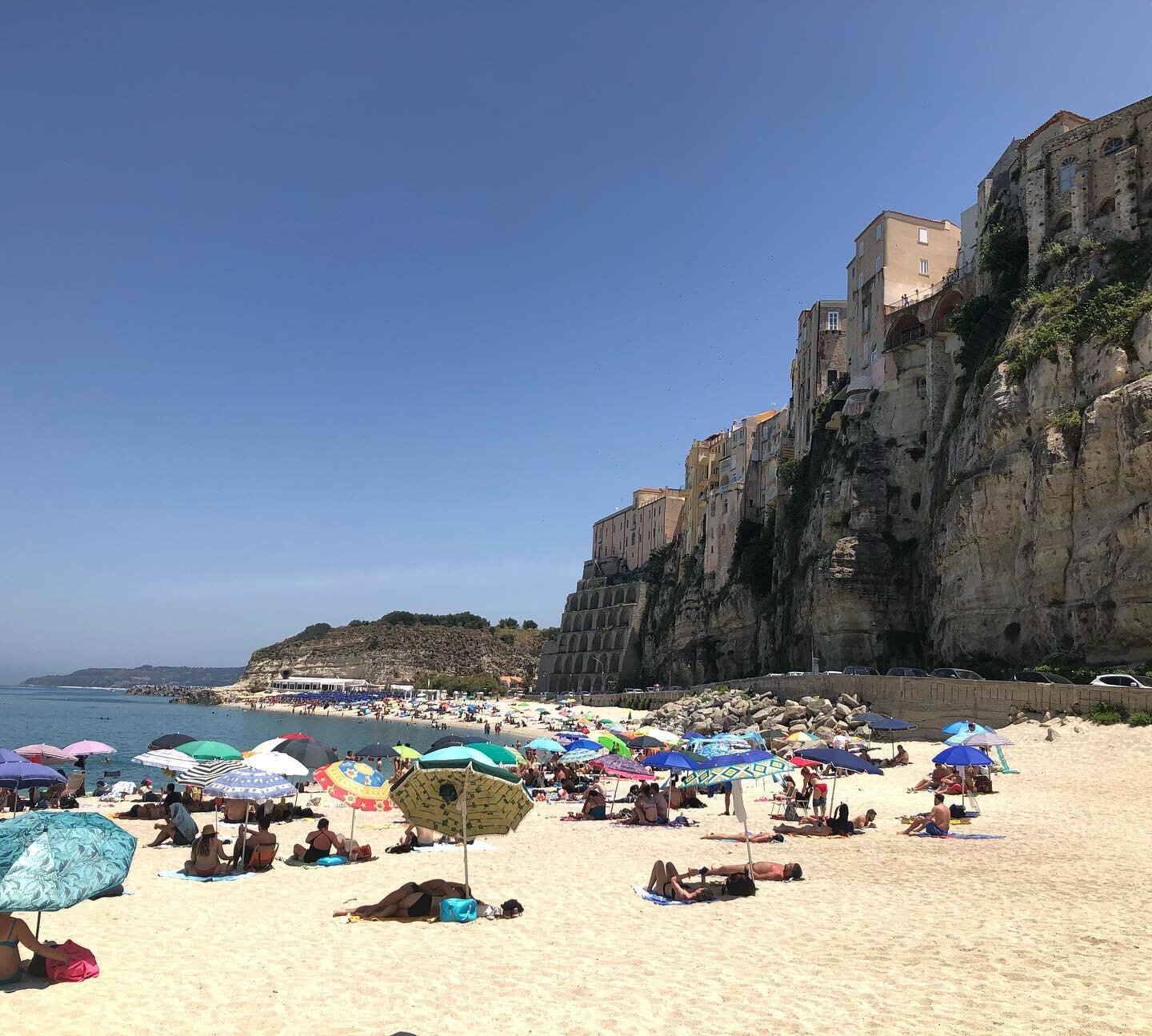 a natural survey of calabrian beaches brings us to la spiaggia la rotonda. this is a public beach unsullied by traffic both human and auto. its isolae built into the cliffs overlook bathes and dives into the waveless inlet with a sand shelf that drop