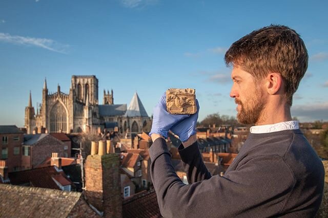 Over the coming weeks we will be sharing images of Romans-age artefacts discovered by @YATNews on previous excavations in York .

In the meantime, here is a photo of Ian Milsted, Head of Archaeology at York Archaeological Trust, holding an altar frag