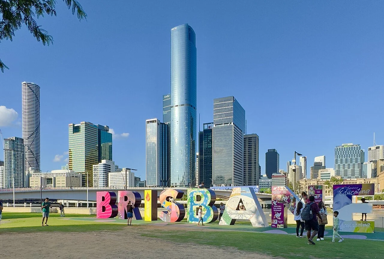 Brisbane sign at Southbank with the city skyline in the background