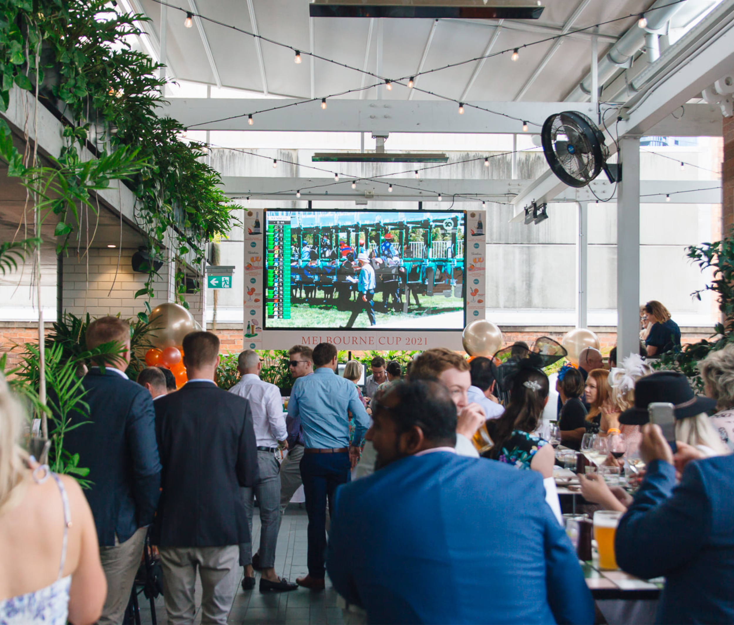 Patrons watching the screens at the Boundary Hotel in West End