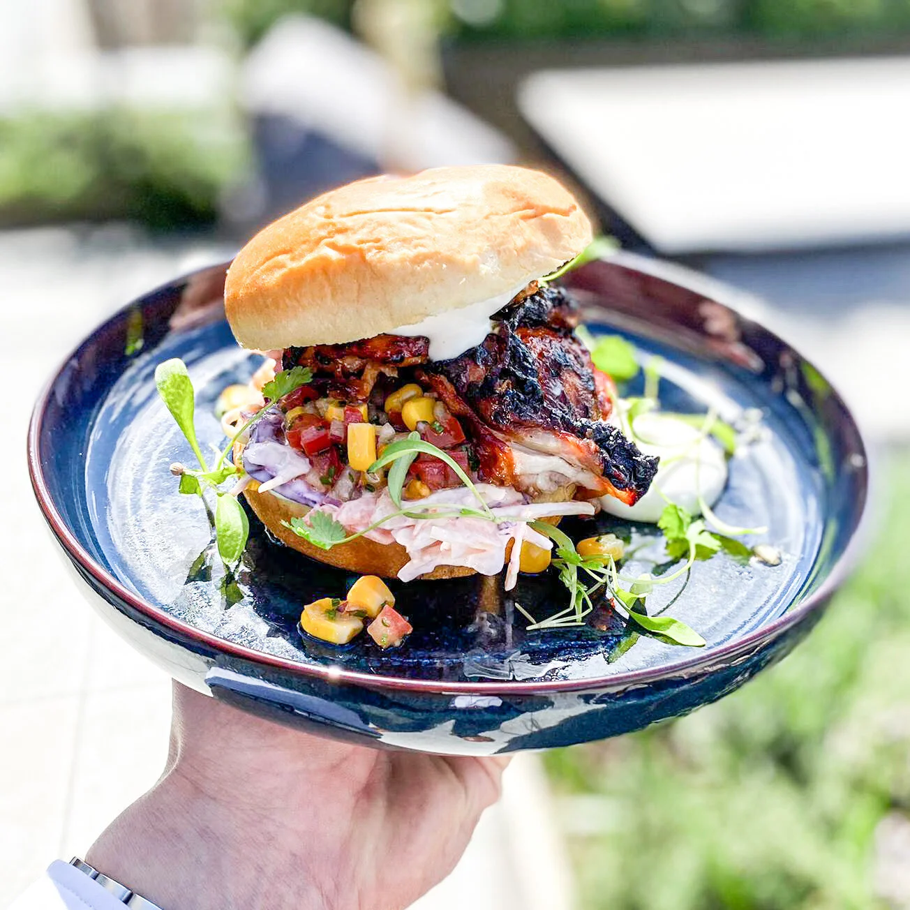 A fully loaded Cajun spiced chicken burger from one of our locations today 😍

#eatwell
#havefun
#promisesdelivered