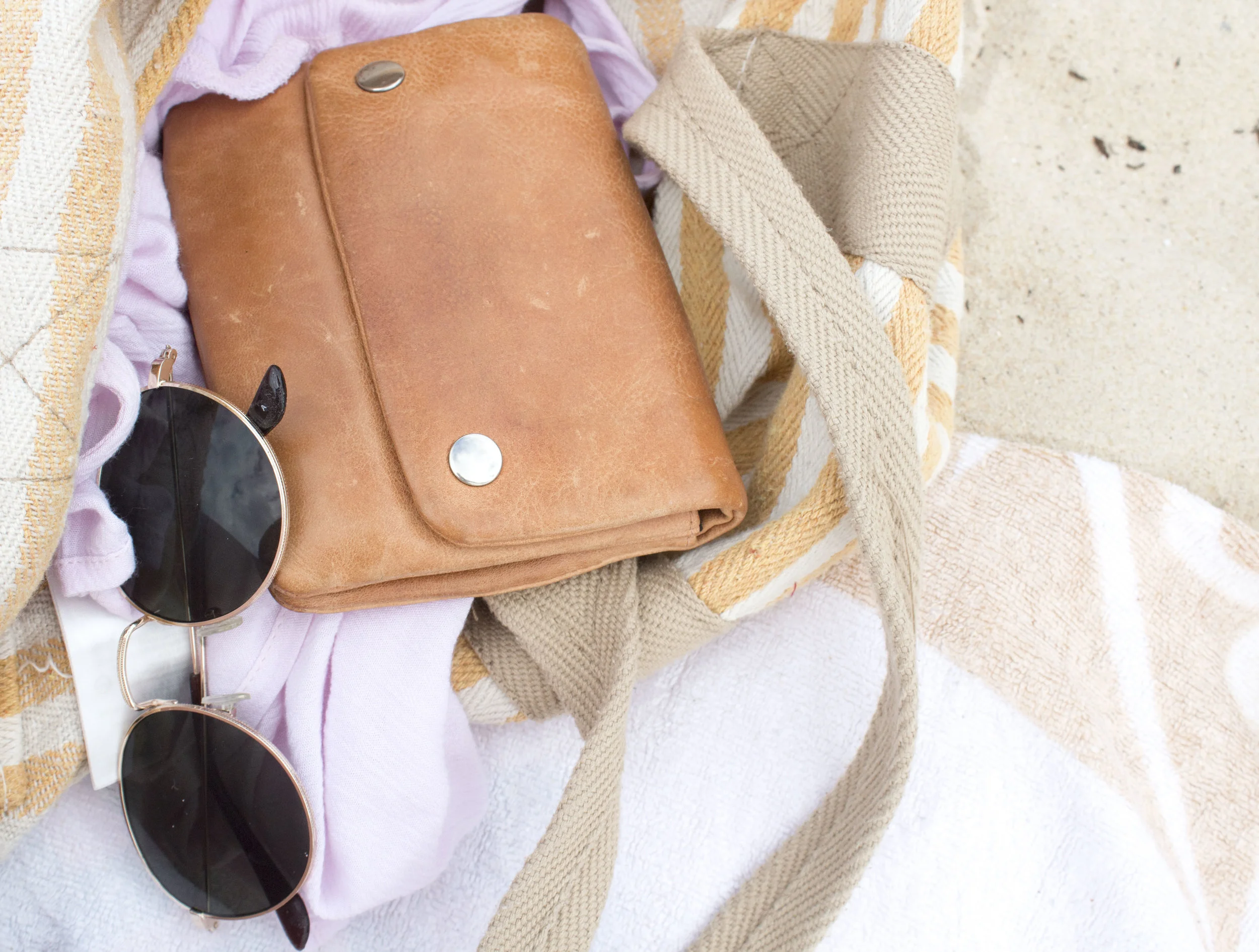 Beach essentials for your handbag this summer