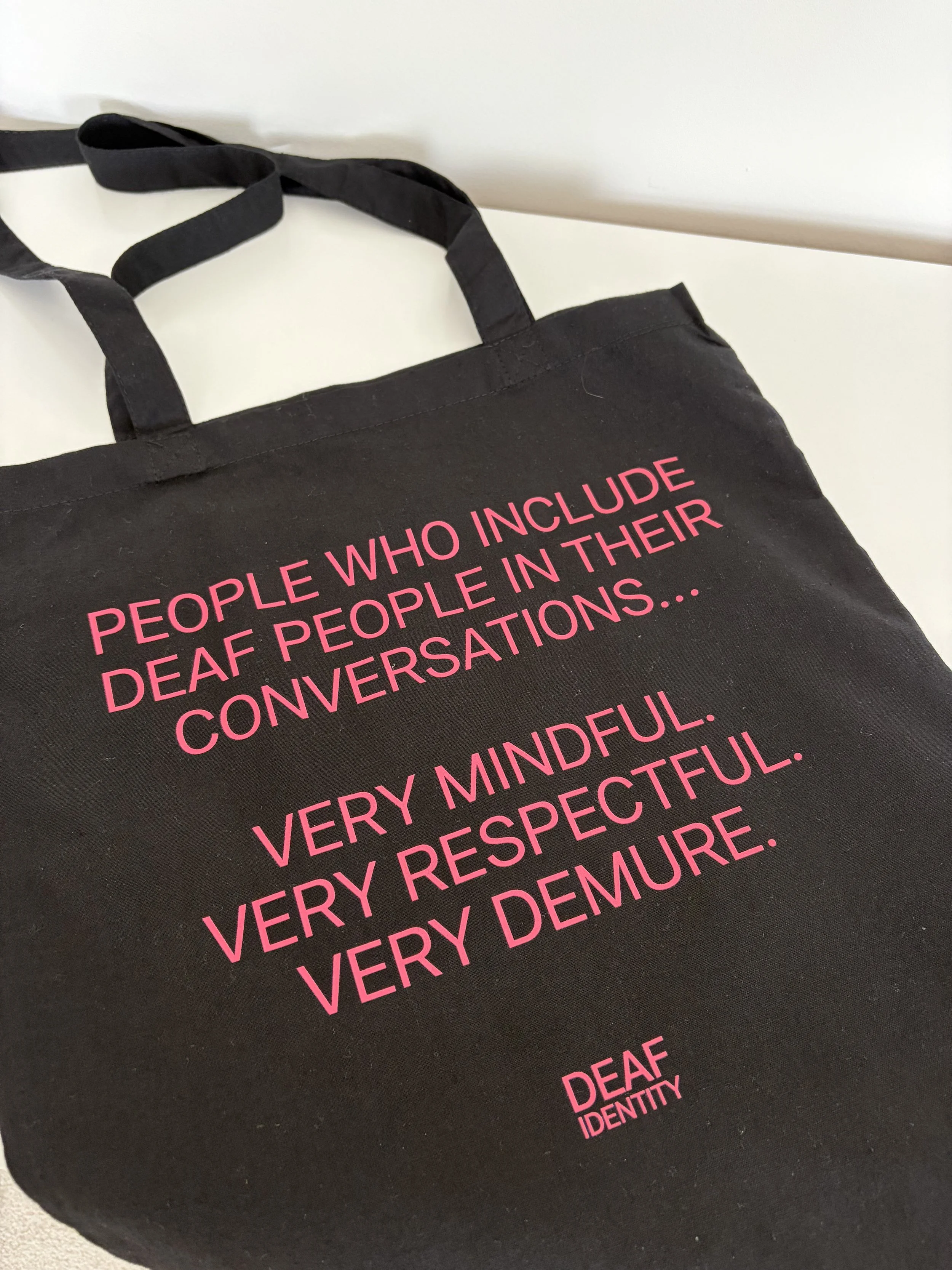 ACCESSORIES SALE: 'VERY DEMURE' IN BLOSSOM INK ON BLACK TOTE BAG