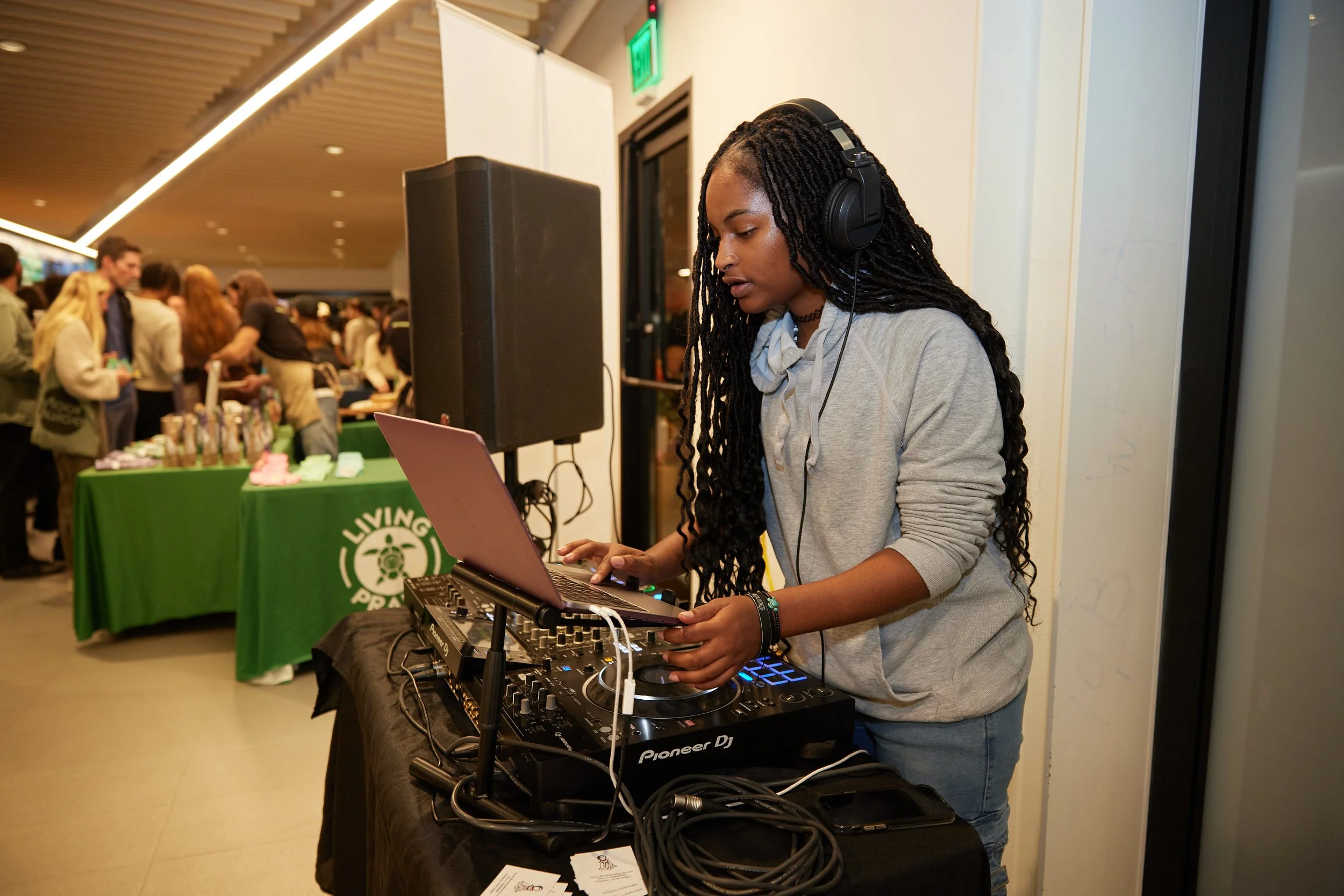 dj-mixing-at-pioneer-decks-during-event.jpeg