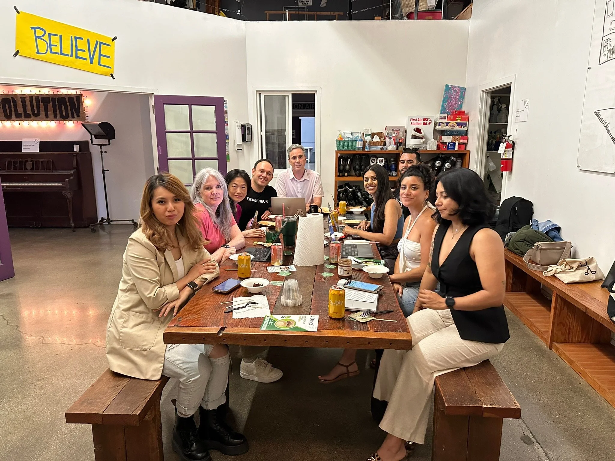 group-dinner-at-creative-studio-believe-sign.JPG