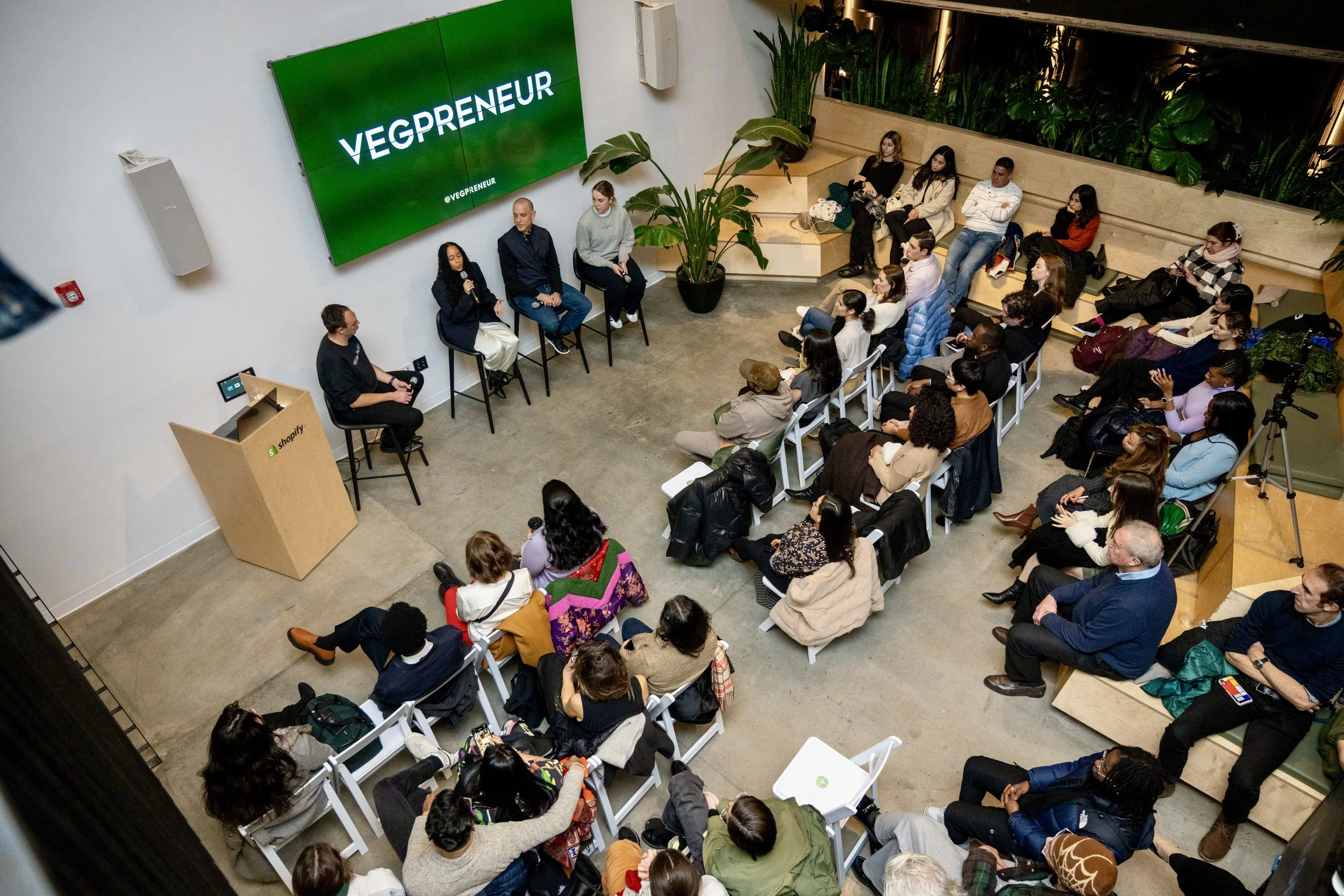 overhead-panel-discussion-with-audience.jpeg