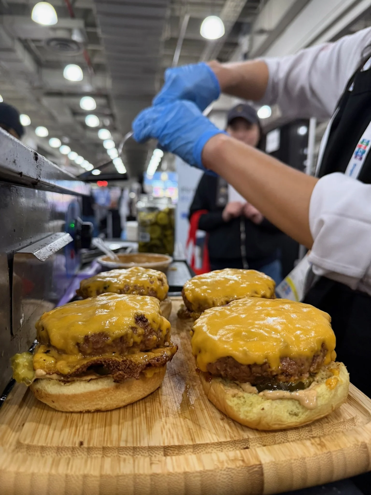 plant-based-cheeseburgers-on-cutting-board-closeup.JPG