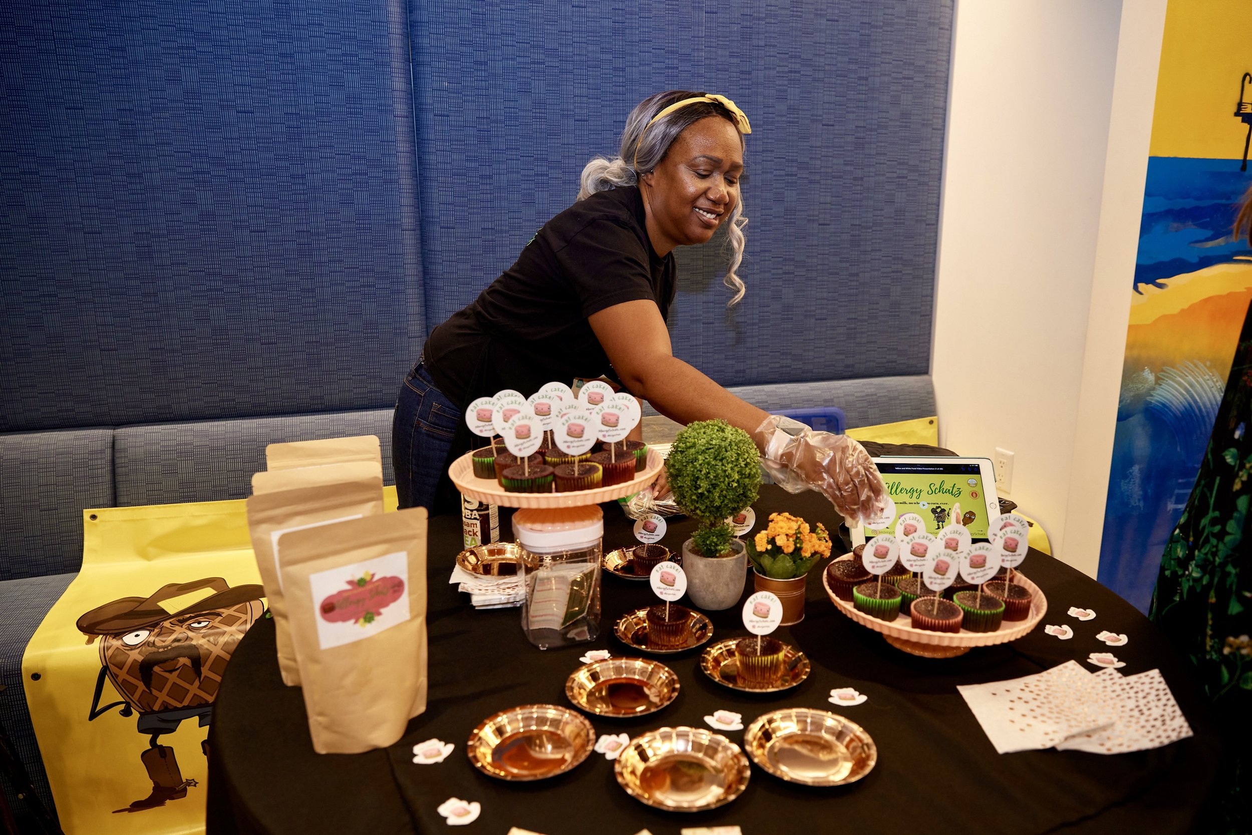 woman-setting-up-cupcake-tasting-display.jpeg