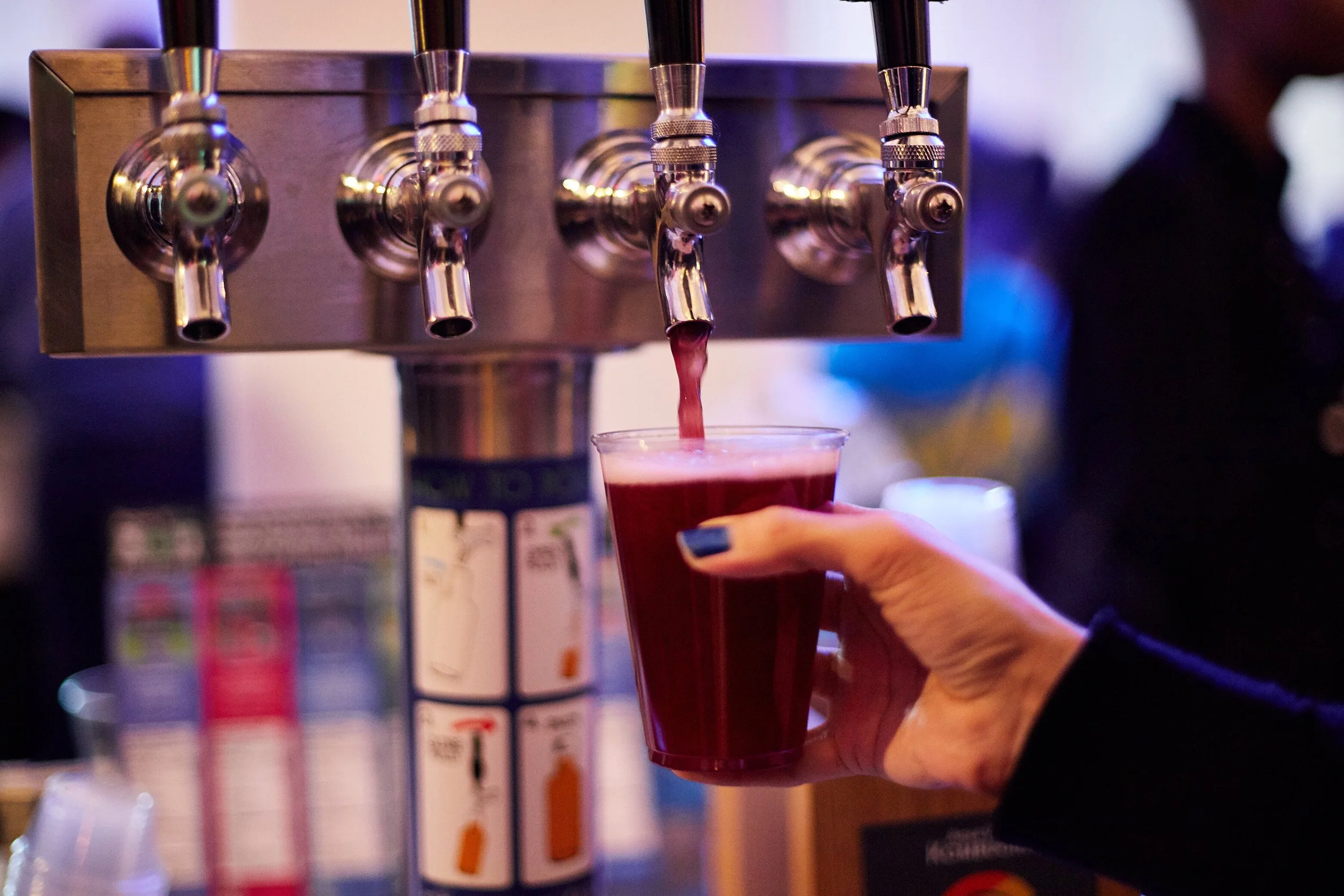 kombucha-on-tap-pouring-red-drink.jpeg