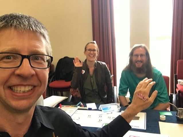Tony (foreground) showing off his grievous wound, which has just been patched up by the crew of the Medical Ship Salvador (background), in Den of Wolves Wellington. Tony was an officer on the ICSS Aegis (Photo by Tony Martin)