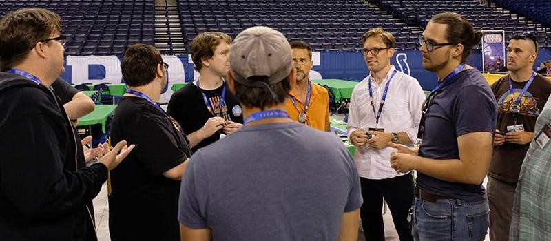 Debriefing at the end ALLIANCE Last Days among a mix of high school students, college students, teachers, and adult board game enthusiasts.