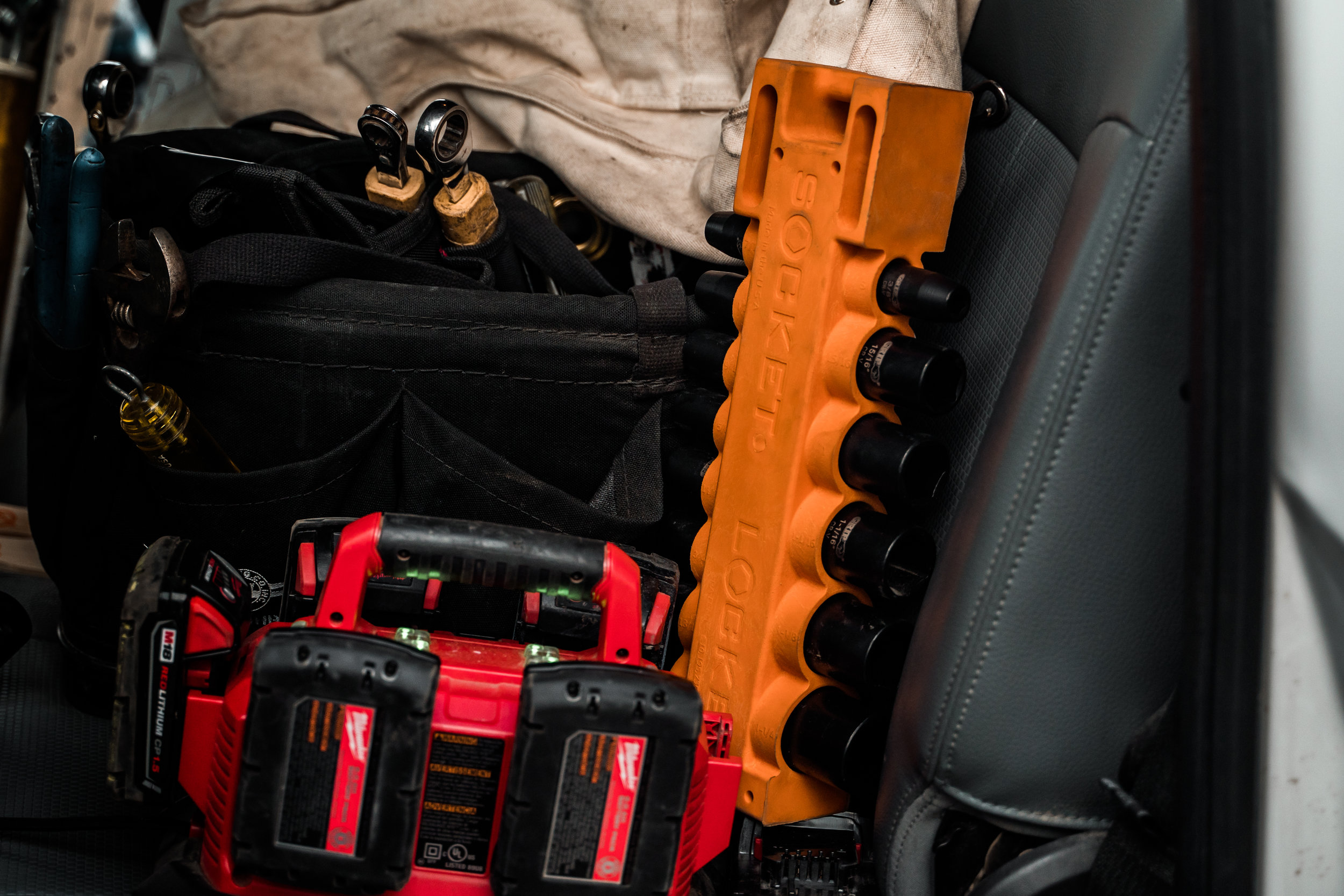 Socket Locker in work truck with lineman tools