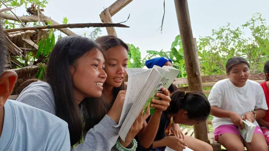 We gave out food and medicine and building supplies and clothes and many things, but we bring Jesus with us wherever we go. These girls are excited to see what’s in their new Bible..jpg