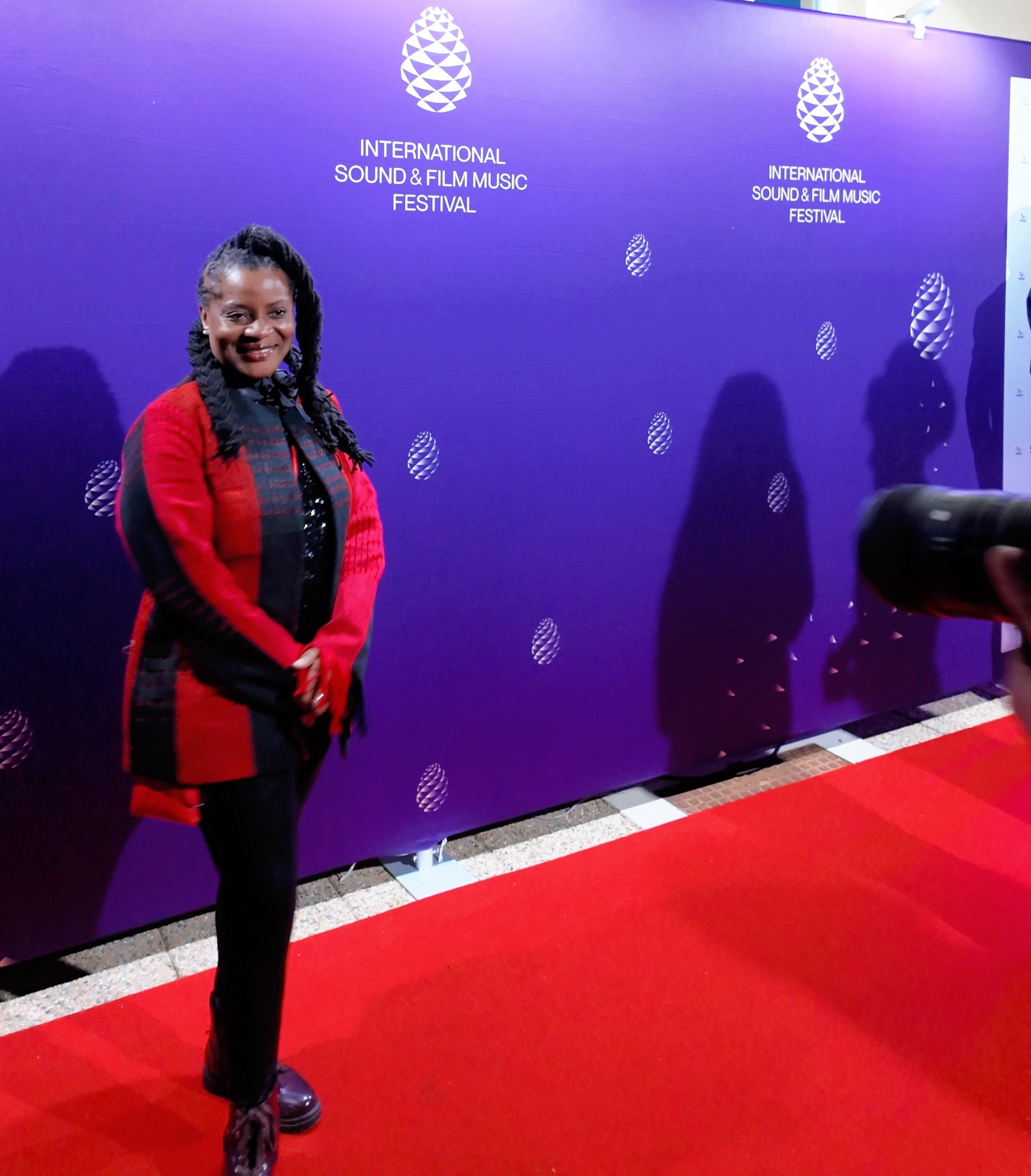DELA: Director Oyiza Adaba on the red carpet at ISFMF 2024. DELA was nominated for the Crystal Pine Award in Best Picture (Feature-length Category). Photo by Africa-Relatd